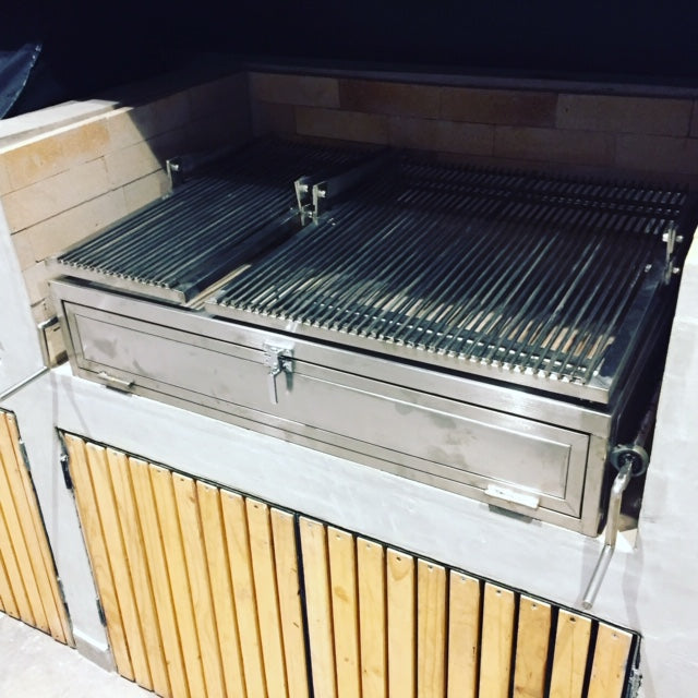 Parrilla con sistema de levante frontal